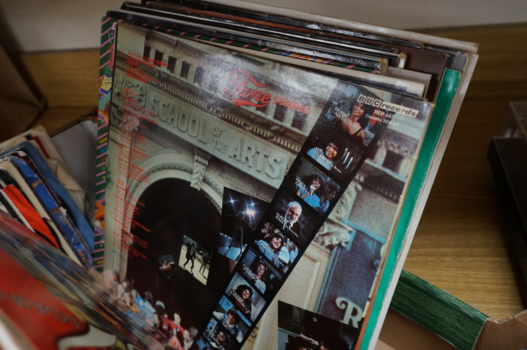 A collection of LP record albums, 12” singles and 7” singles, artists include; Dire Straits, Queen, ELO, Michael Jackson, etc.